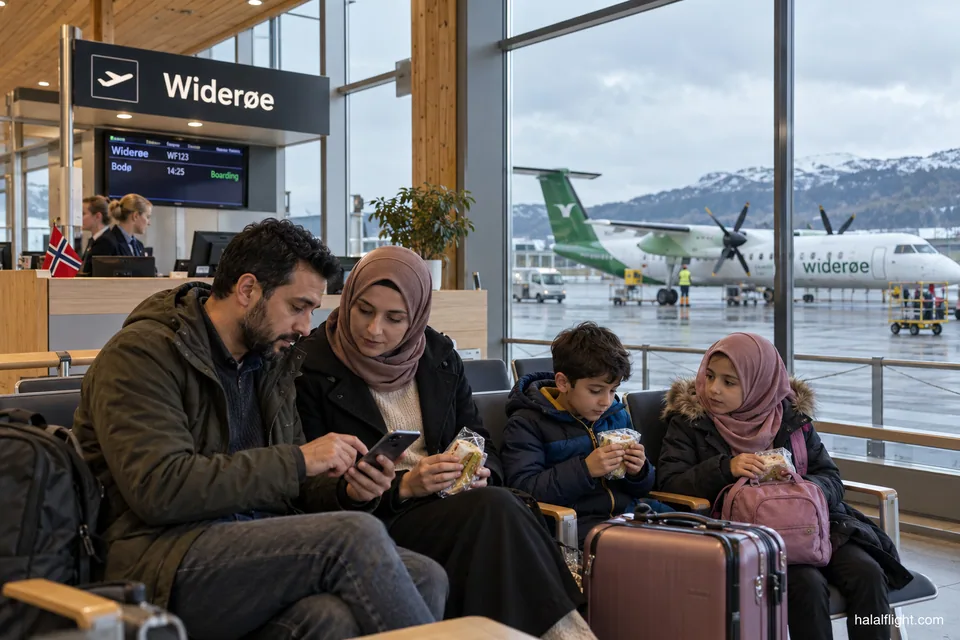 Famille assise près d’une porte d’embarquement Widerøe, regardant des documents de voyage et de la nourriture